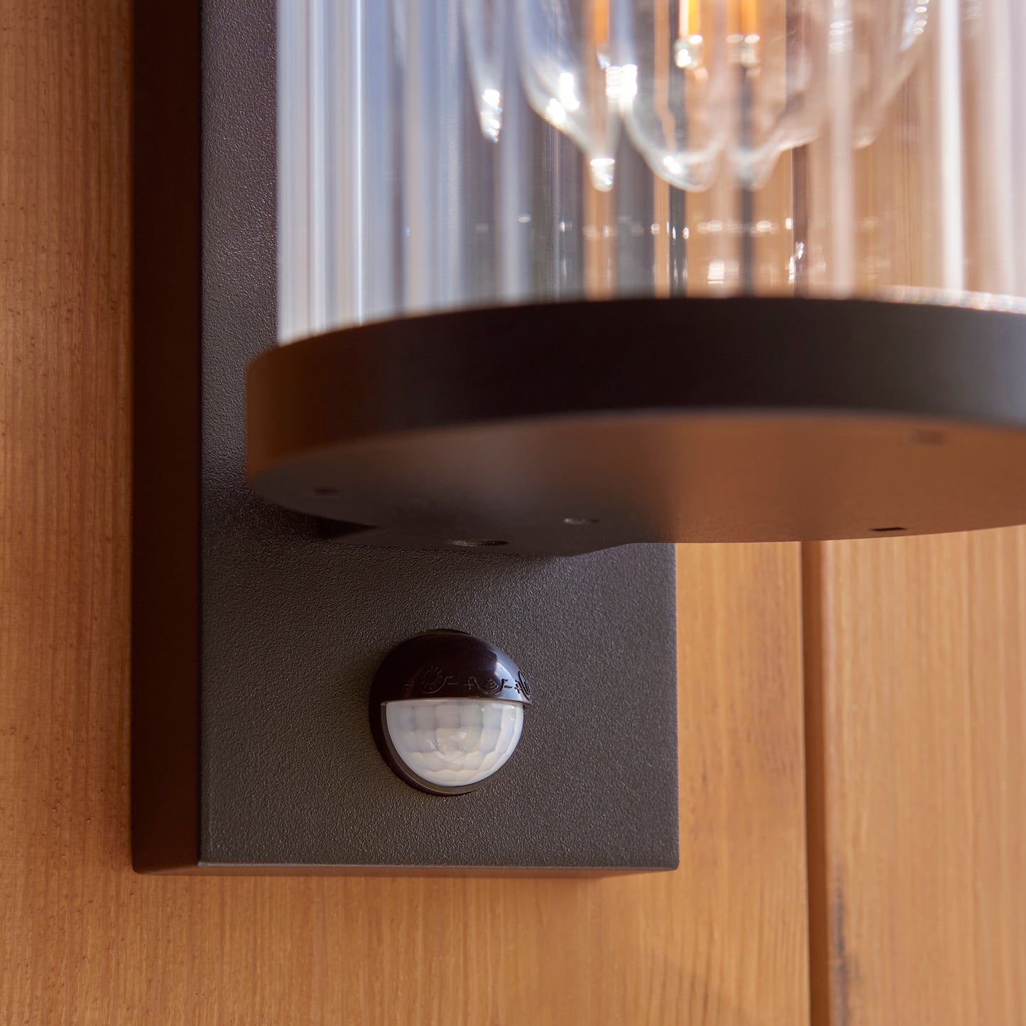 Outdoor Wall Light with Integrated PIR in Black with Ribbed Glass - ID 13968