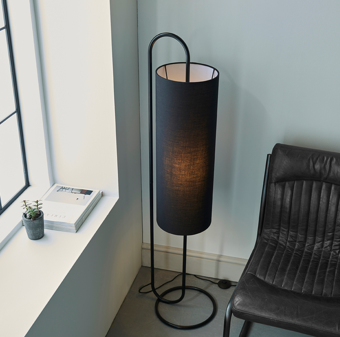 Oval structural matt black floor light with black fabric shade - ID 11398