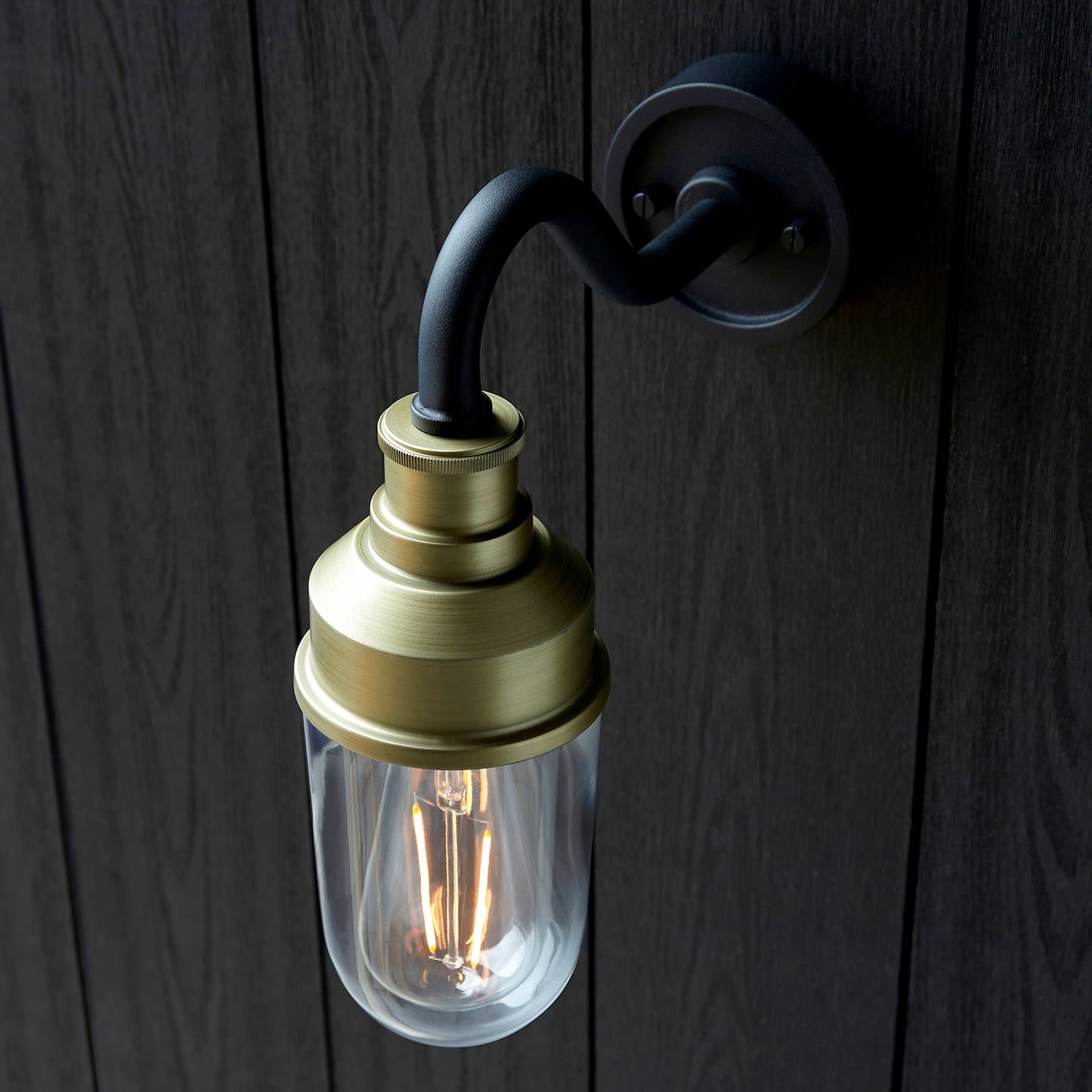 Matt Antique Brass Curved Arm Wall Light With Clear Glass - ID 12497